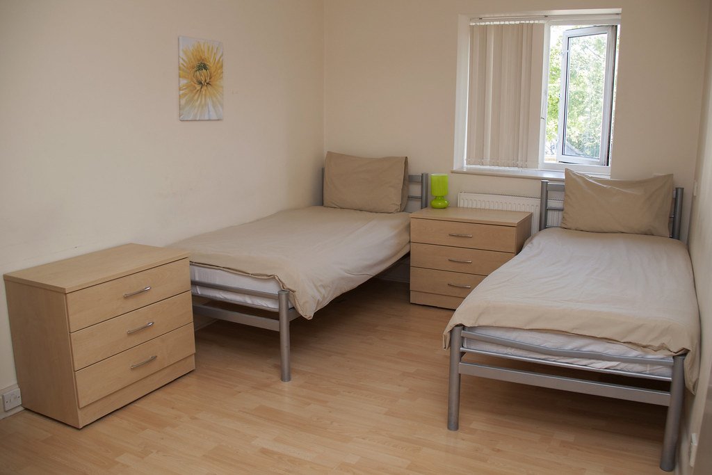 Residence room with brown bedding